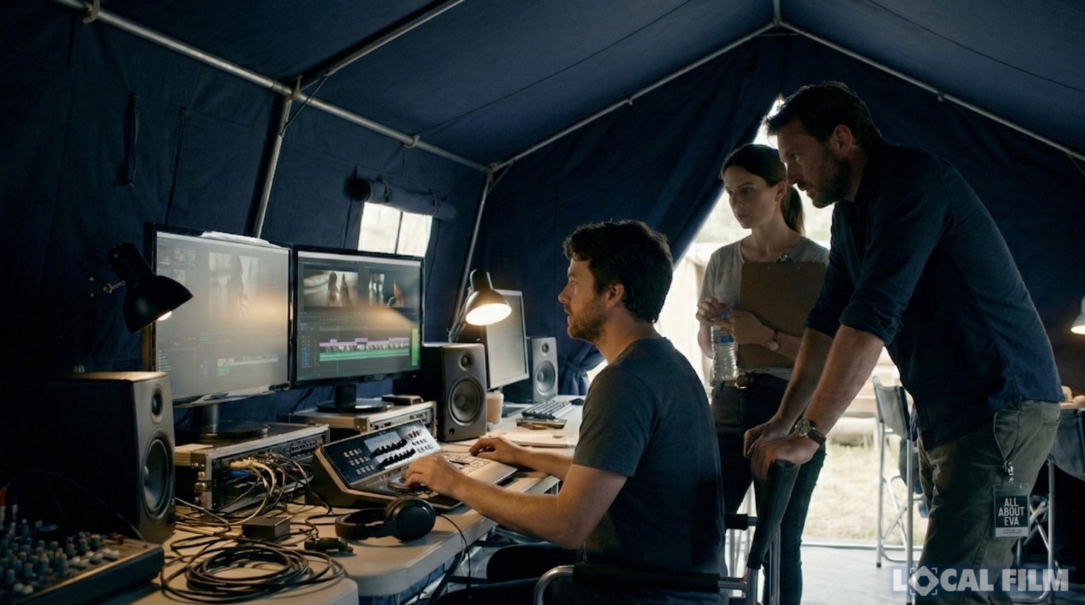 Director and director of photography reviewing a monitor together